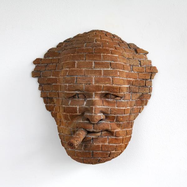 Brick Face with Cigar, 1975 ceramic 13 1/4 x 13 1/...